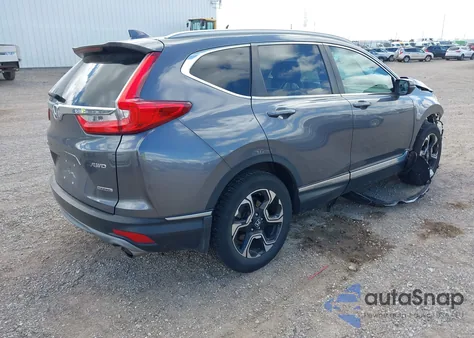 2019 Honda Cr-V Touring z USA, uszkodzony, nr VIN 5J6RW2H91KL001951